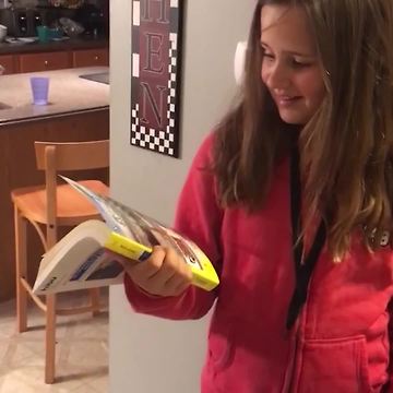 Pile Of Yellow Pages Leaves Clueless Teenage Girl Utterly Confused