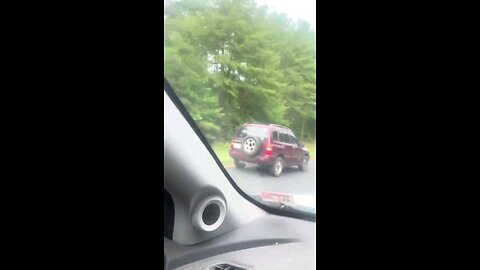 Woman flips her car during a road rage incident after she tried passing a car on the left shoulder.