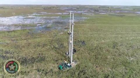 Everglades power crews assisted by law enforcement airboats