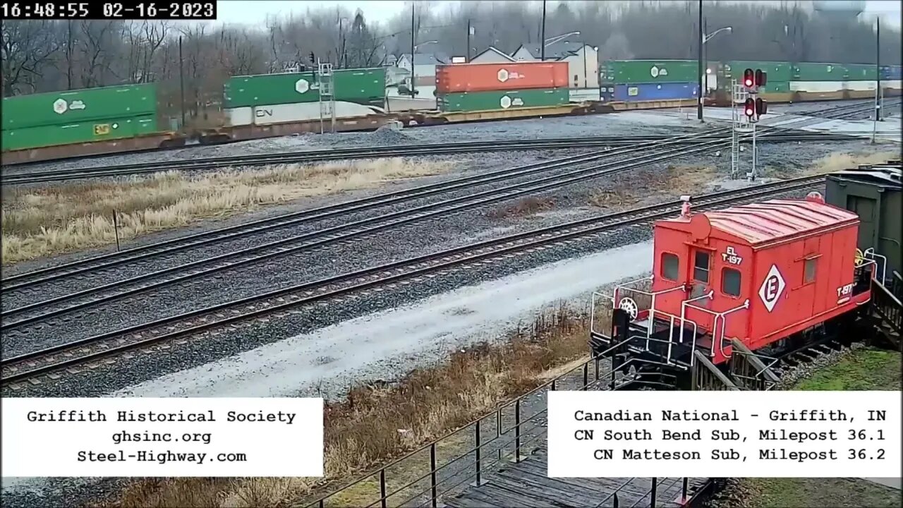 EB Intermodal/Autorack with Passenger Car on end of train in Griffith, IN on February 16, 2023