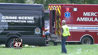 UPDATE: Body retrieved from under manhole cover