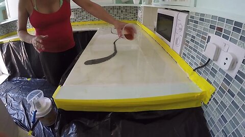 Fiona doing her resin counter tops.