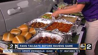 Baltimore Ravens fans tailgate before the season home opener