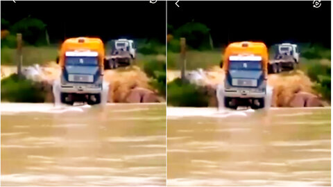 TRUCK CROSSING RIVER.