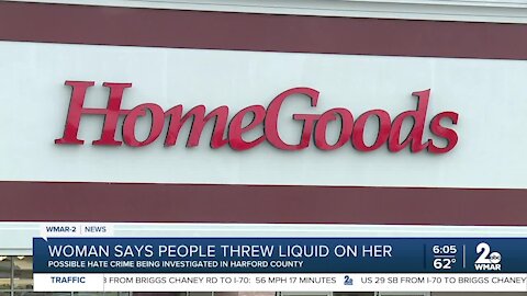 Woman says people threw liquid on her