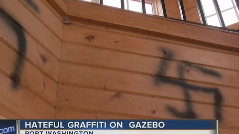 Hateful graffiti on gazebo