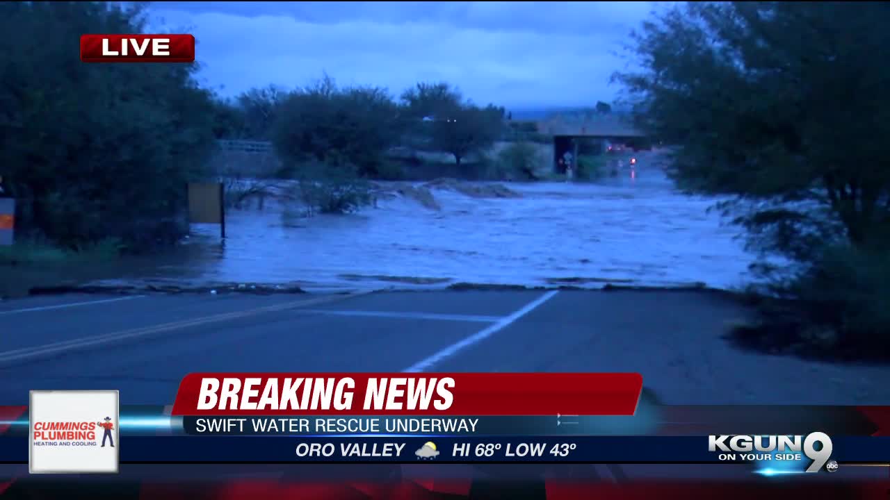 Crews rescue man stuck in car near Orange Grove and River