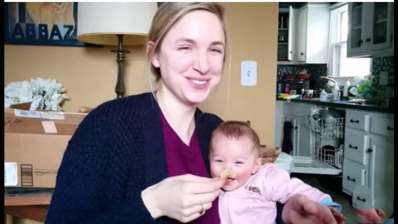 Baby laughs at her mama eating banana Crips chips