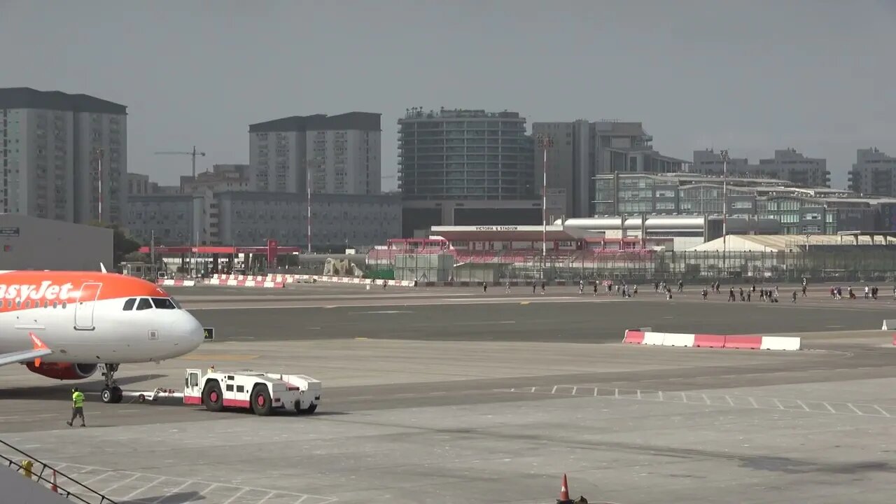 easyJet Pushback as People Walk Across the Runway