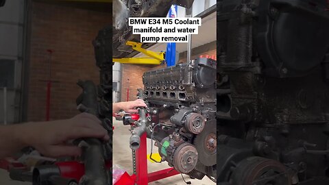 BMW E34 M5 Coolant manifold and water pump removal restoration #shorts #bmw #diy #bmwm5 #bmwe34