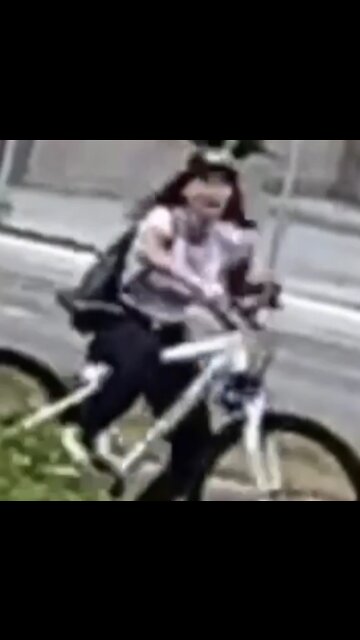 Girl falls off bike
