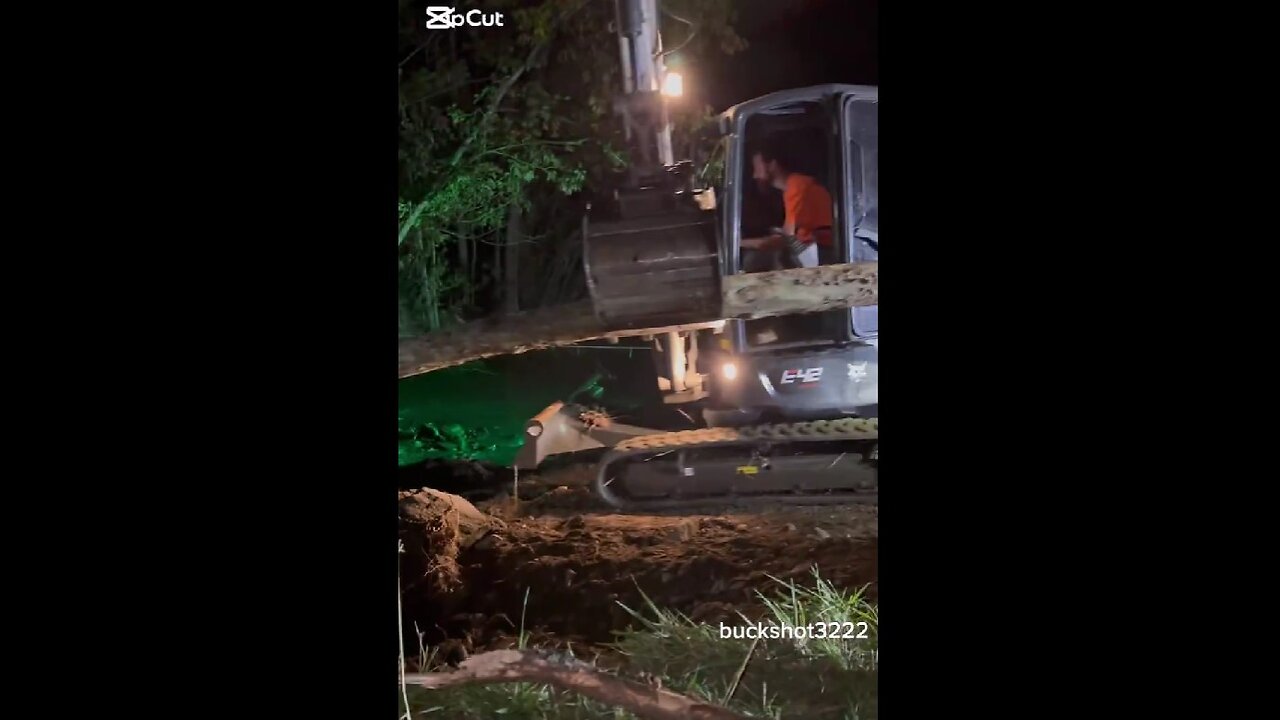 These are regular Americans rebuilding a bridge in an area affected by Hurricane Helene.