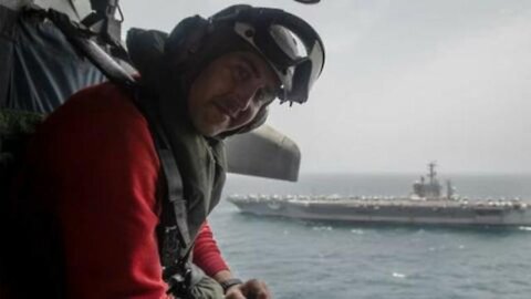 Sailor Reenlists aboard a Helicopter