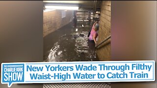 New Yorkers Wade Through Filthy Waist-High Water to Catch Train