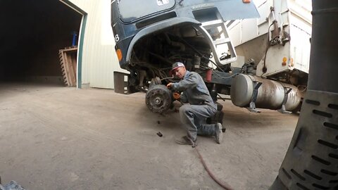 Replacing a broken leaf spring.