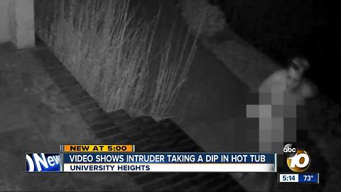 Caught on video: intruder takes dip in hot tub