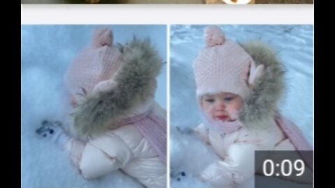 Baby loves snow , puts entire face in it