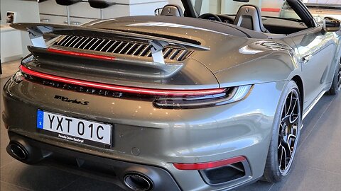 8k Aventurine Green Porsche 992 Turbo S Convertible super high resolution at Porsche Center Dandeyd