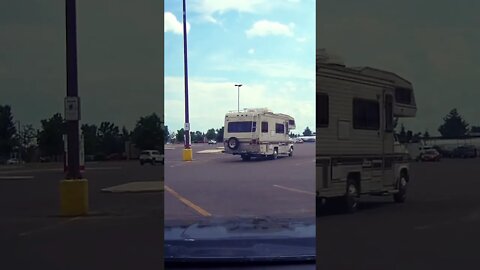 Camper in parking lot