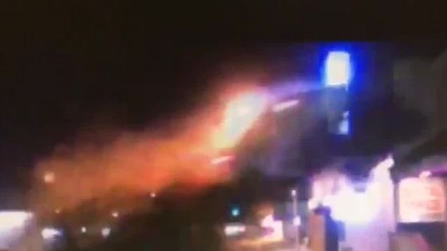 New video shows car airborne, slamming into 2nd floor of building
