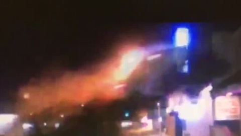 New video shows car airborne, slamming into 2nd floor of building