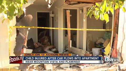 Child injured after car plows into living room