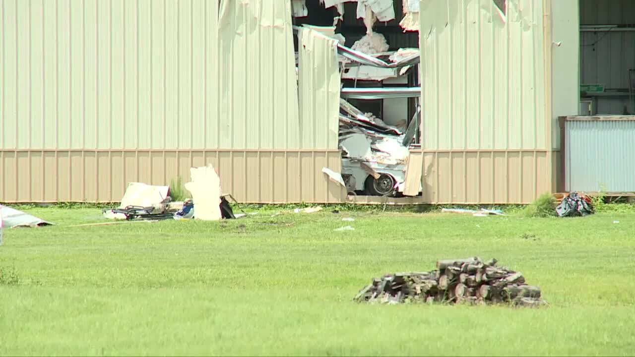 'It was like a bomb:' Woman describes seeing plane crash into garage