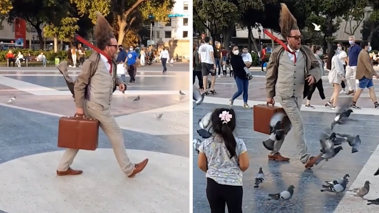 Street performer's "frozen in time" stance will totally blow your beutiful mind