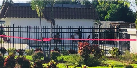 Teenager, child hospitalized after being pulled from swimming pool, officials say