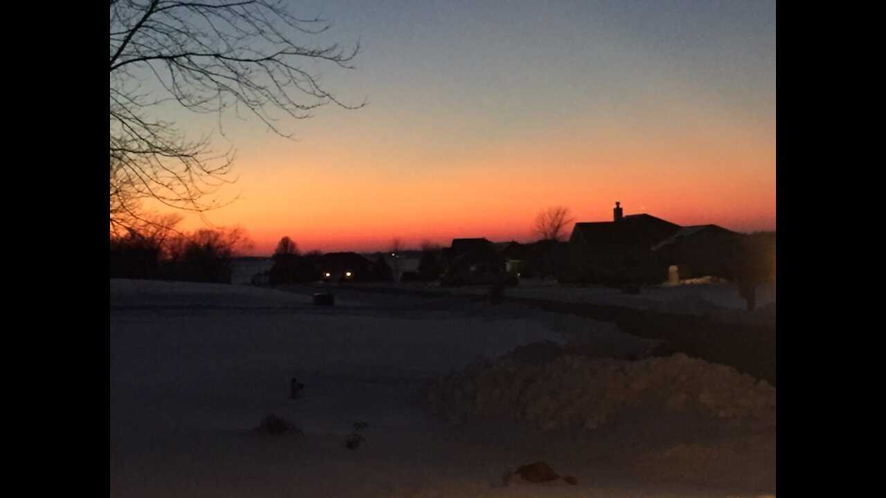 Sunset and snowy fields