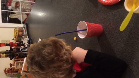 "A Tot Boy Won't Eat His Macaroni and Cheese Until He Sees Santa"