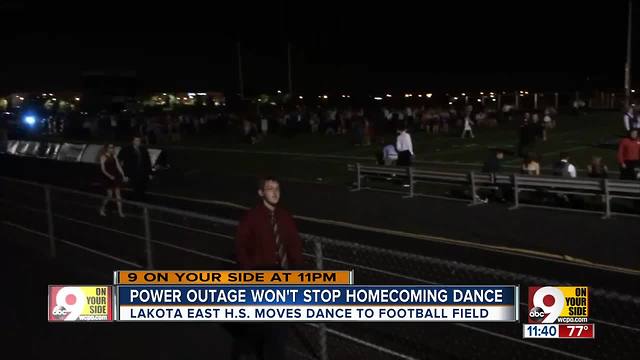 Without power, Lakota East High School holds homecoming dance under the lights