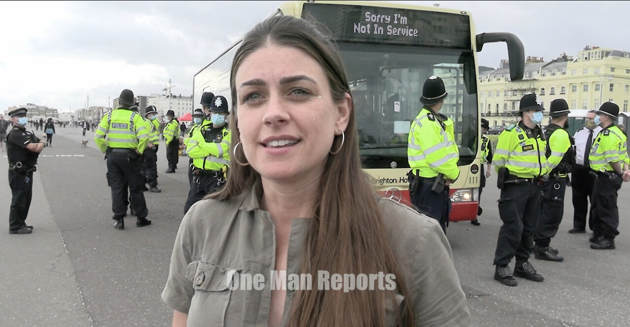 Louise Hampton in front of blocked Vaccination Bus in Brighton