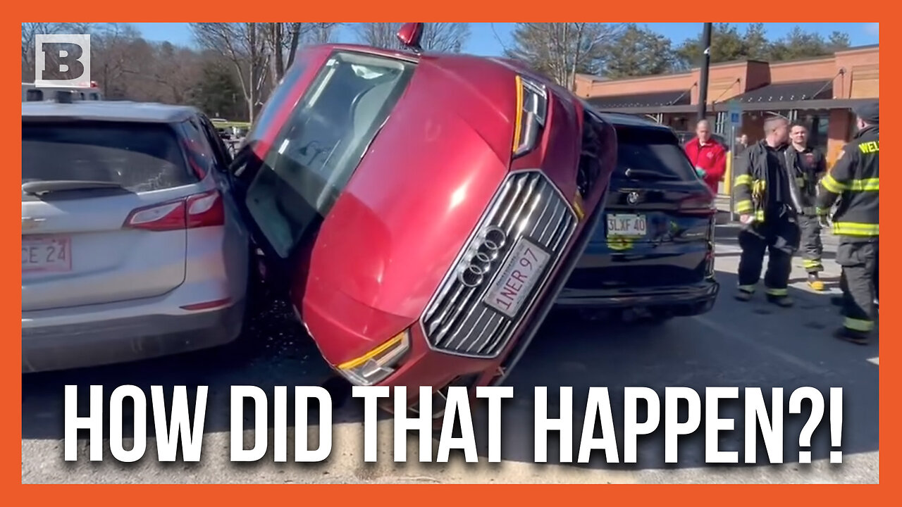 How Did That Happen? Audi Ends Up Wedged Between Parked Cars