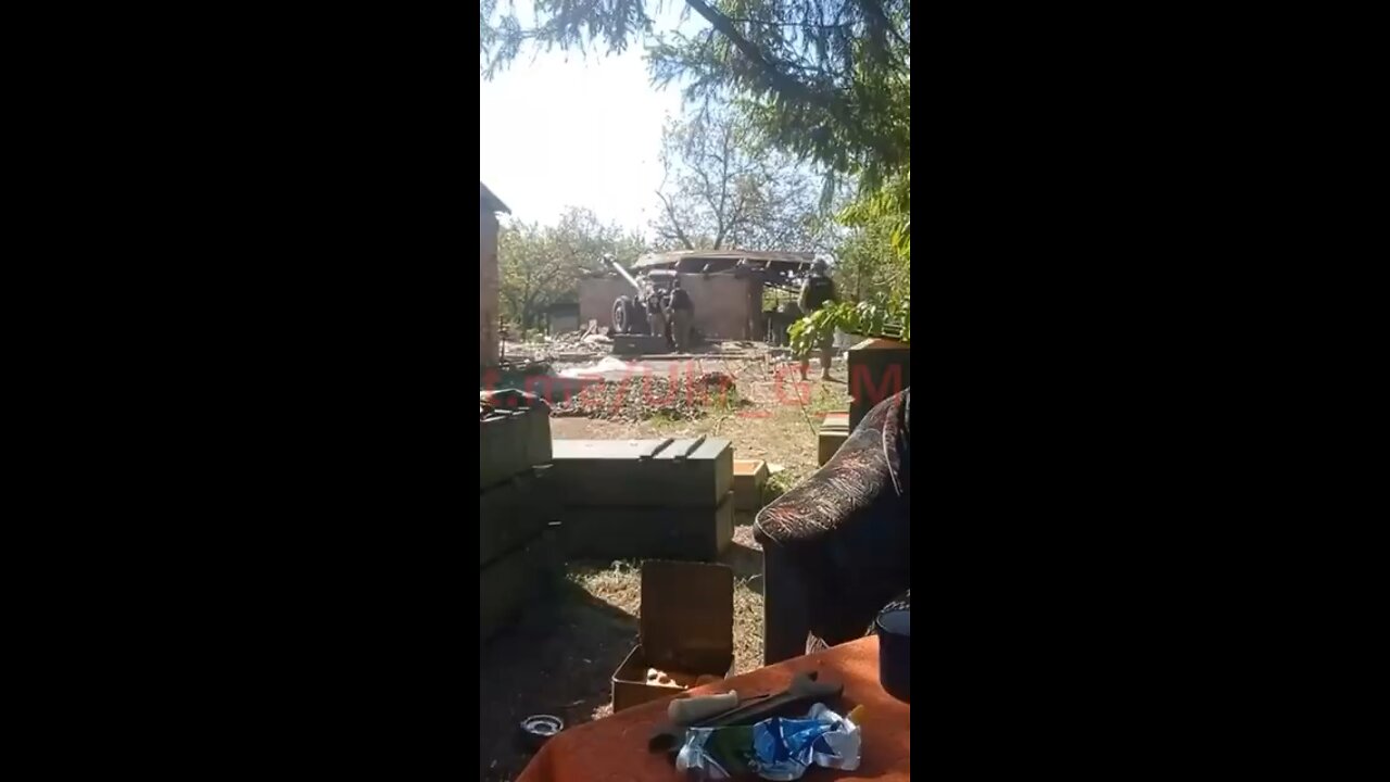 Ukrainian forces firing weapons near civilian homes