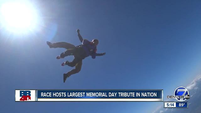 Katie LaSalle trains with the skydivers who carry the flags into Folsom Field at the BolderBOULDER