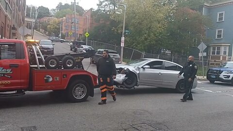 Boston fire and EMS respond to a accident on Heath Street