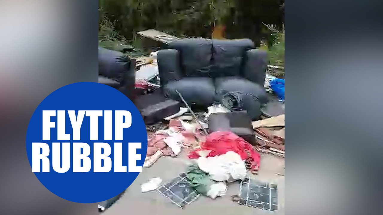 Brazen fly-tippers dump a MILE'S worth of rubbish along a single country lane