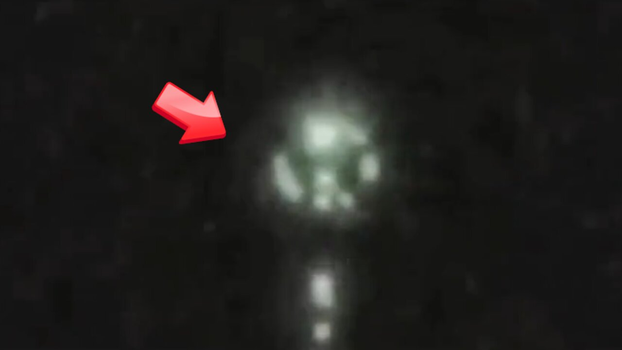 Is the small light object emitted from the green light object a UFO?