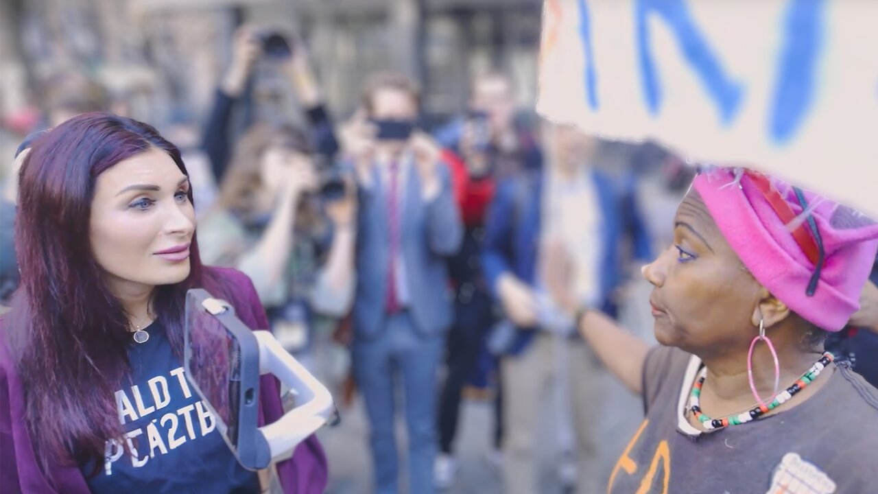 Laura Loomer Harassed by INSANE BLACK Joe Biden Supporter Outside of President Trump's Trial!