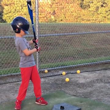 Little Boy Hits Himself With Baseball Bat