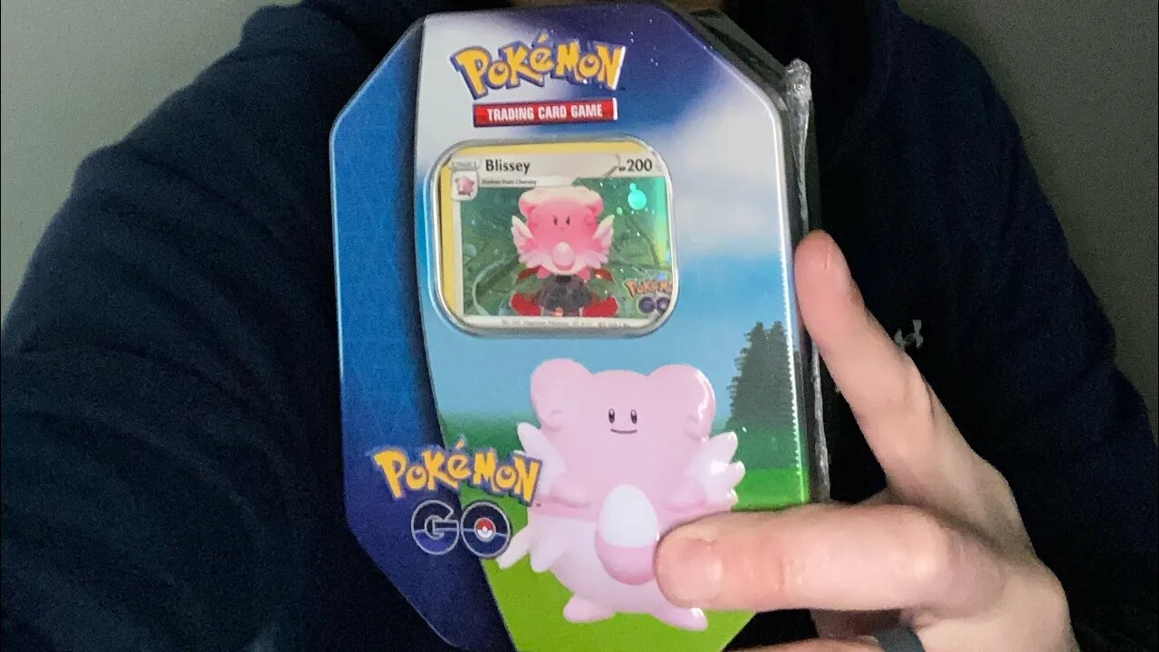 My son opening a Pokémon go tin!