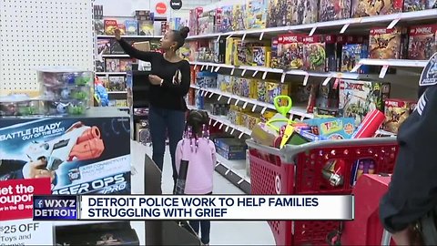 Detroit police officers bring Christmas joy to children of fallen and critically injured officers