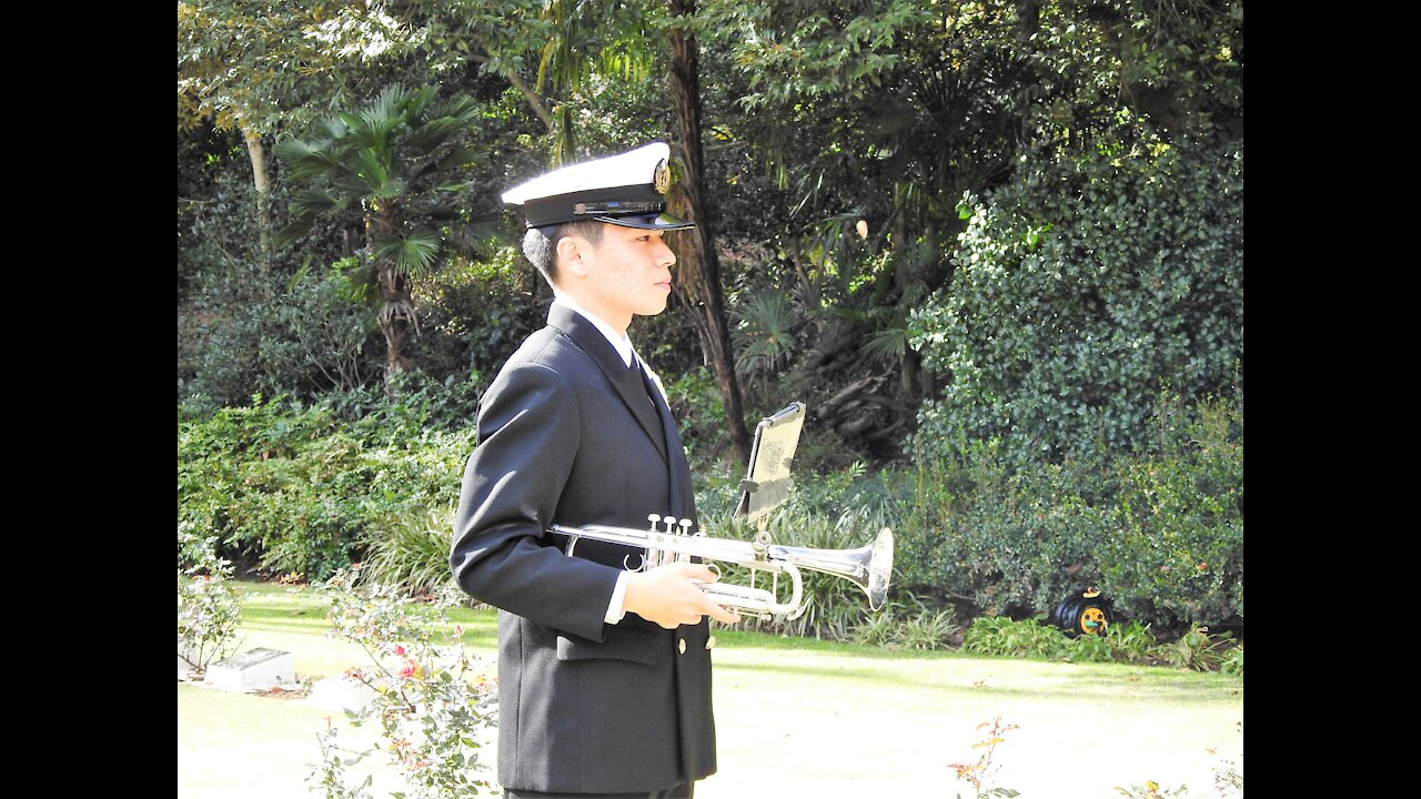 Japanese Sailor playing the bugle at the 2021 Hodogaya Cemetery