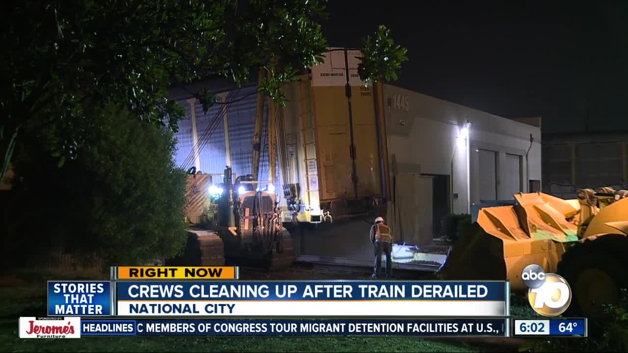 Crews work to clean up mess after train derailment