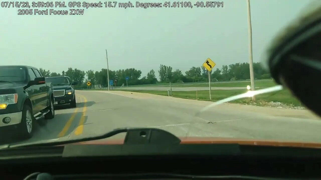 Scott County gang member impeding traffic to allow fellow gang bangers to run a stop sign in mass