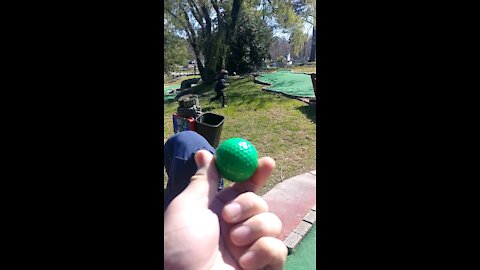 Blind putt-putt hole-in-one prank