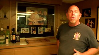 West Allis man shares his large collection of wrestling memorabilia