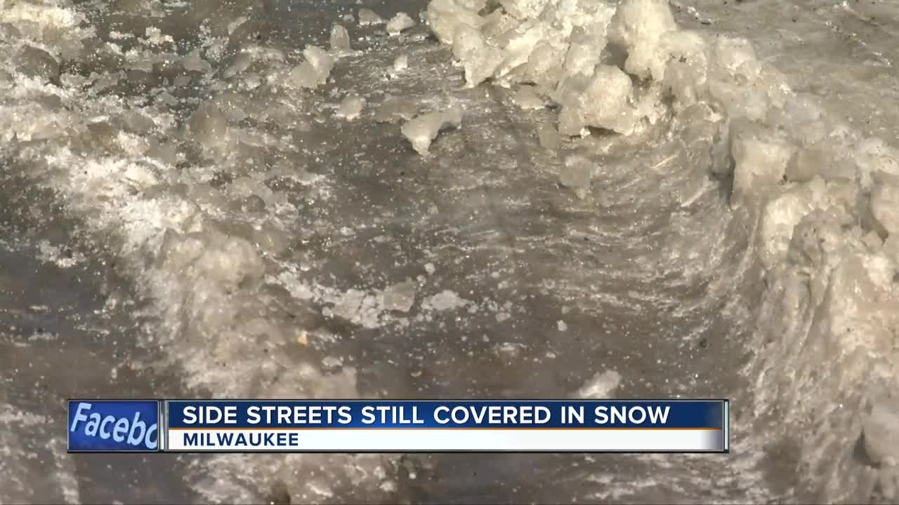 Side streets are still covered in snow leading to traffic jams