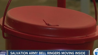 Salvation army bell ringers moving inside